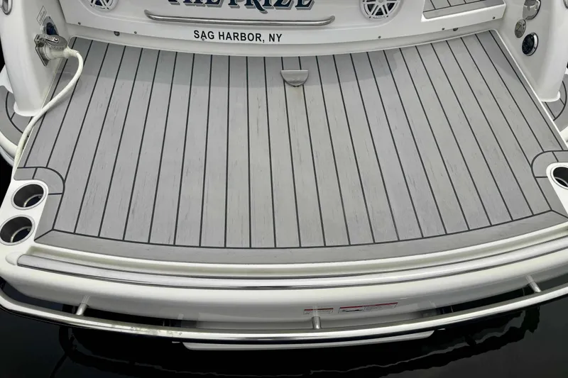 Slide: The Image of 2020 Formula 290 Bowrider boat deck, Sag Harbor, NY, featuring sleek design and cup holders. - 9