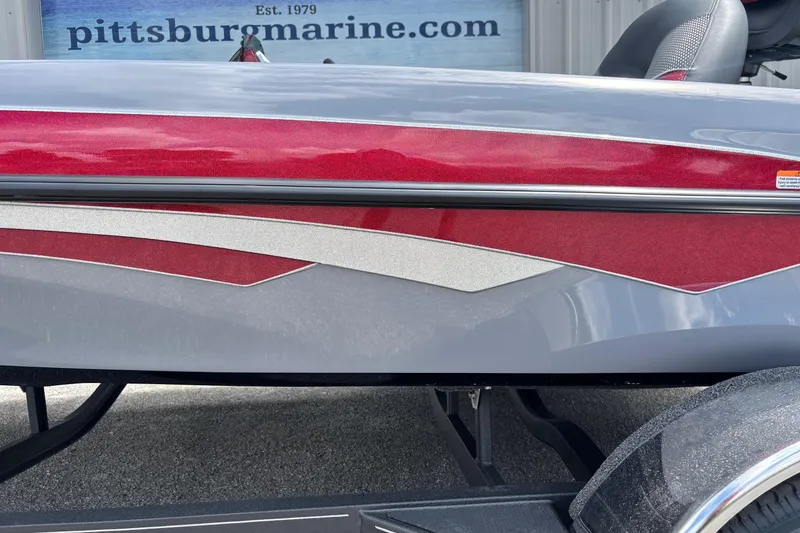 Slide: The Image of 2026 Ranger Z185 boat with red and gray design at Pittsburg Marine. - 12