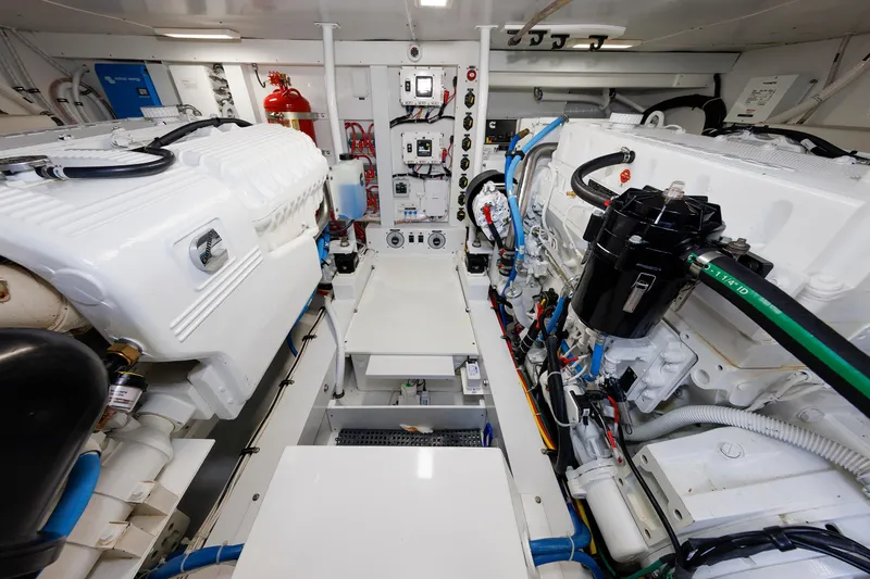Slide: The Image of Engine room of 2023 Henriques 42 Express Hardtop, showcasing dual engines and mechanical systems. - 62