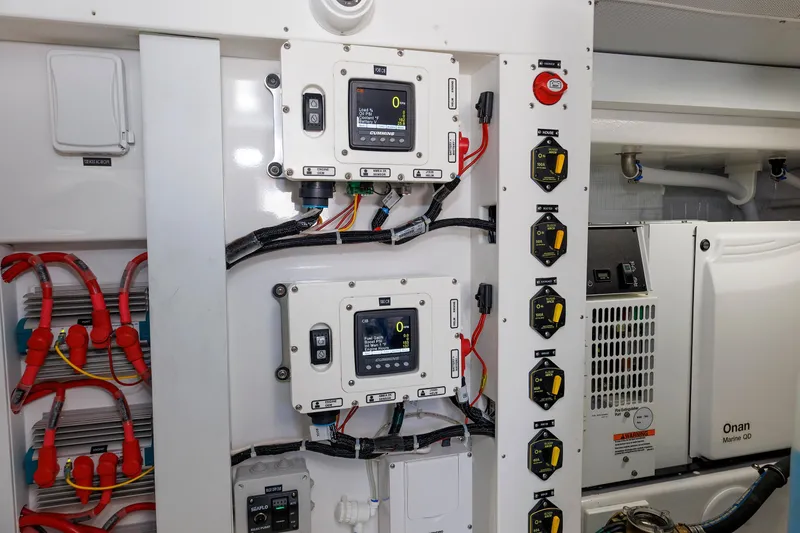 Slide: The Image of Electrical control panel in 2023 Henriques 42 Express Hardtop boat engine room. - 65