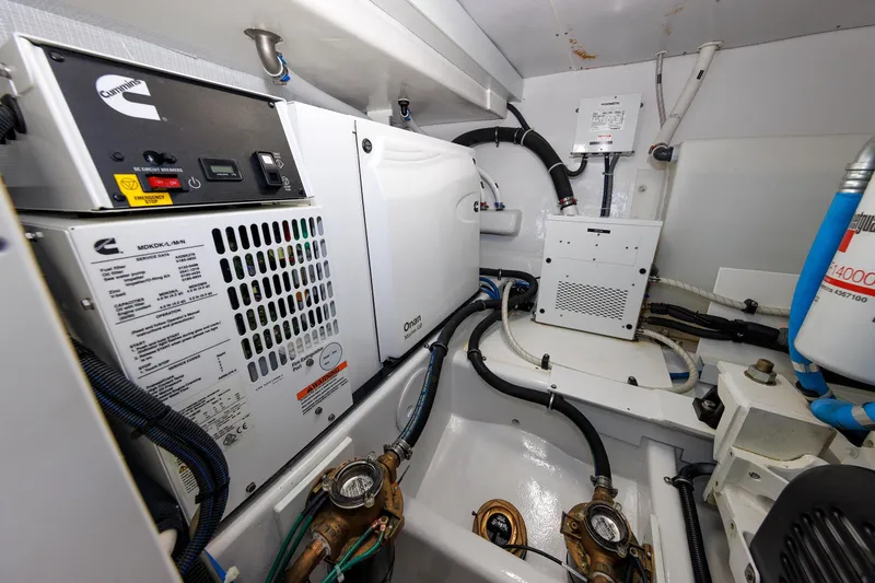 Slide: The Image of Engine room of 2023 Henriques 42 Express Hardtop with Cummins generator and wiring. - 67