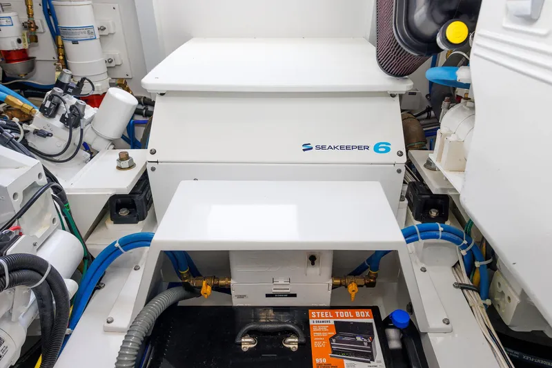 Slide: The Image of Engine room of 2023 Henriques 42 Express Hardtop with Seakeeper 6 stabilizer system. - 69