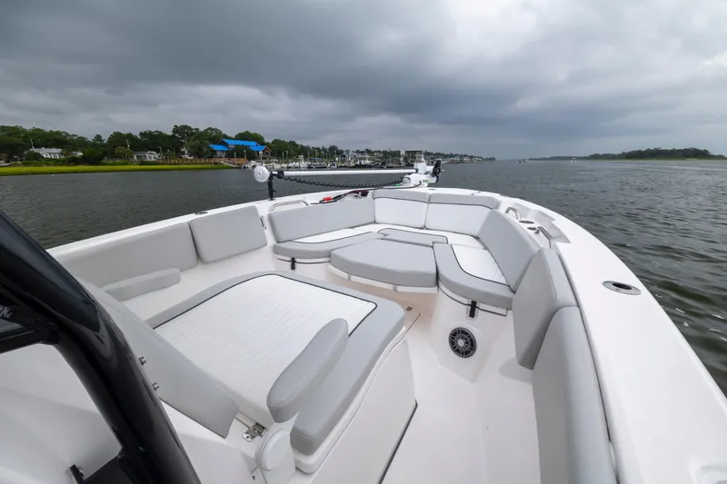 Slide: The Image of 2023 Sea Fox 268 Commander boat with spacious seating on a cloudy day. - 16