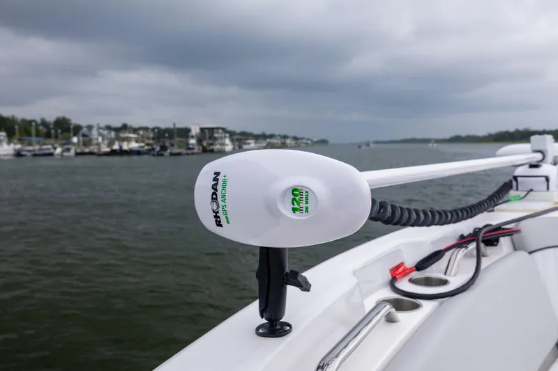 Slide: The Image of 2023 Sea Fox 268 Commander with Minn Kota trolling motor on a cloudy day. - 19