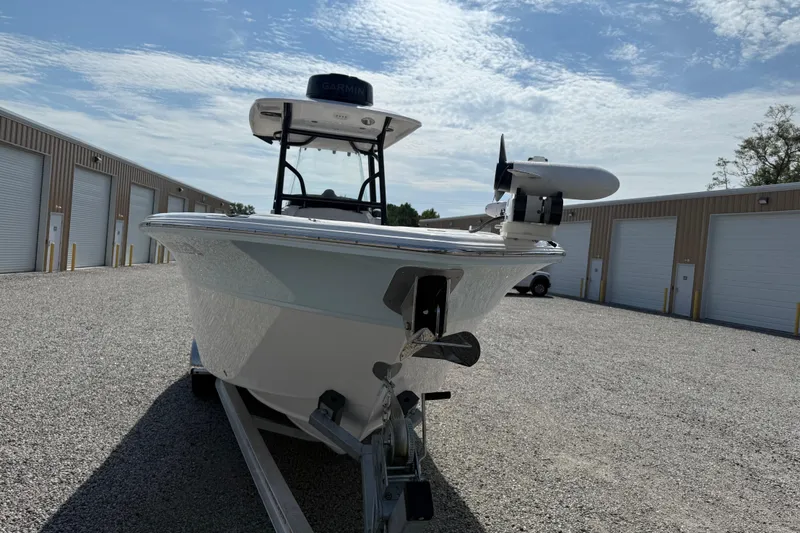 Slide: The Image of 2023 Sea Fox 268 Commander boat on trailer, parked near storage units. - 39