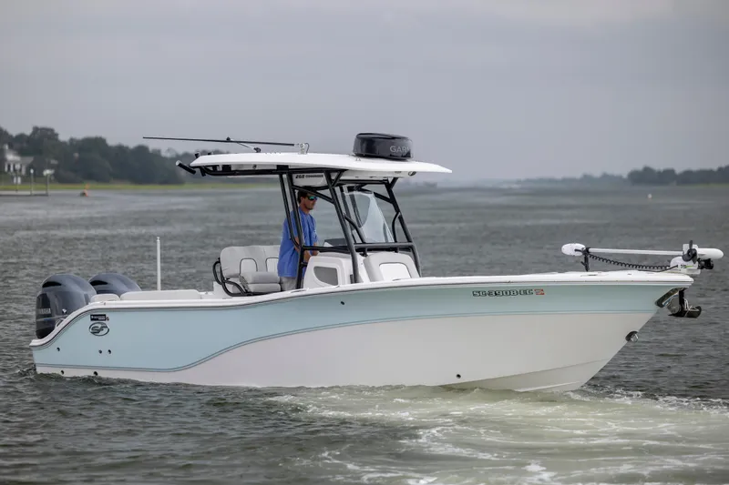 Slide: The Image of 2023 Sea Fox 268 Commander boat cruising on a calm waterway. - 4