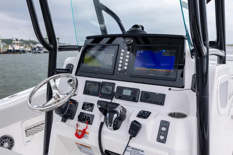 Slide: The Image of 2023 Sea Fox 268 Commander boat dashboard with advanced navigation and control systems. - 9