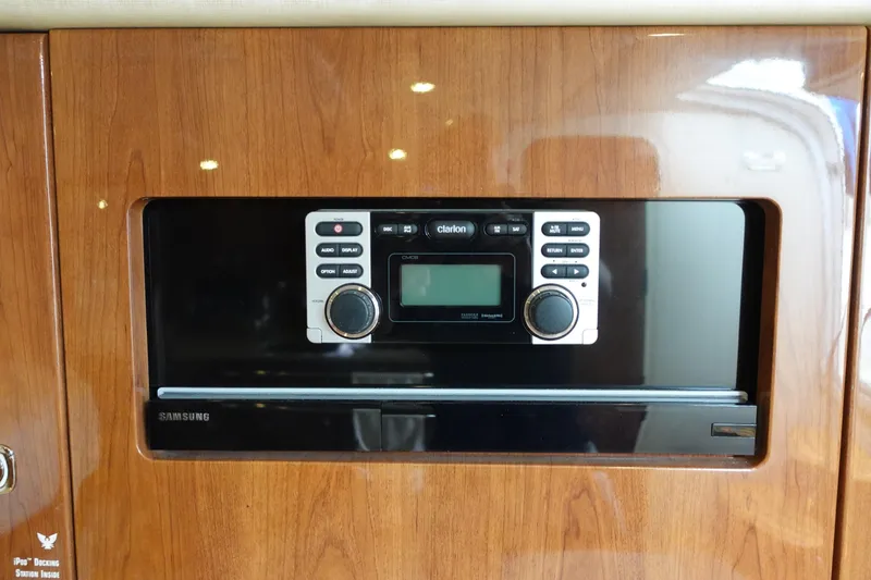 Slide: The Image of Built-in stereo system on 2016 Formula 34 Cruiser with wood paneling. - 25