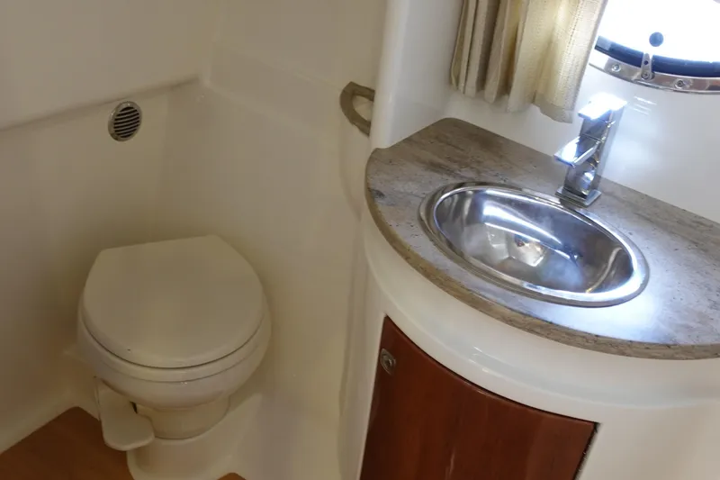 Slide: The Image of 2016 Formula 34 Cruiser bathroom with sink and toilet. - 26