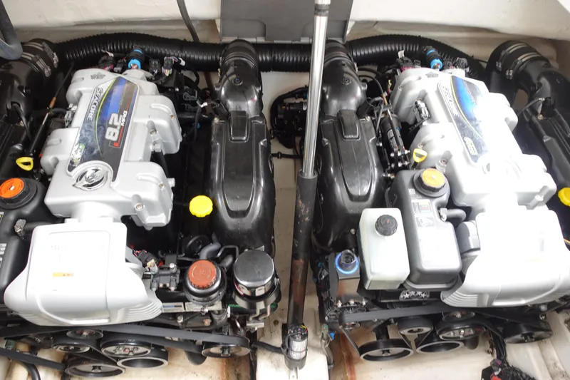 Slide: The Image of Twin engines in a 2016 Formula 34 Cruiser boat, showcasing powerful marine engineering. - 27