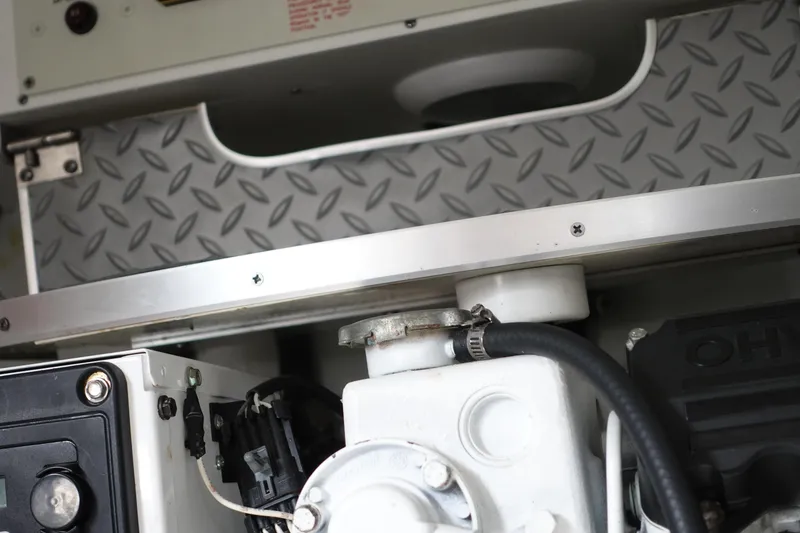 Slide: The Image of Engine compartment of a 2016 Formula 34 Cruiser with diamond plate detailing. - 30