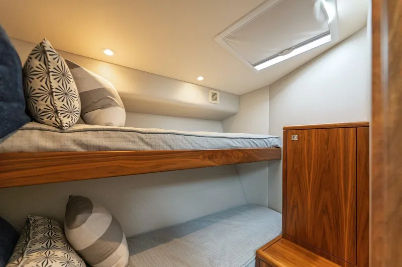 Slide: The Image of Cozy cabin with bunk beds in 2018 Hatteras GT45X Flybridge yacht. - 10