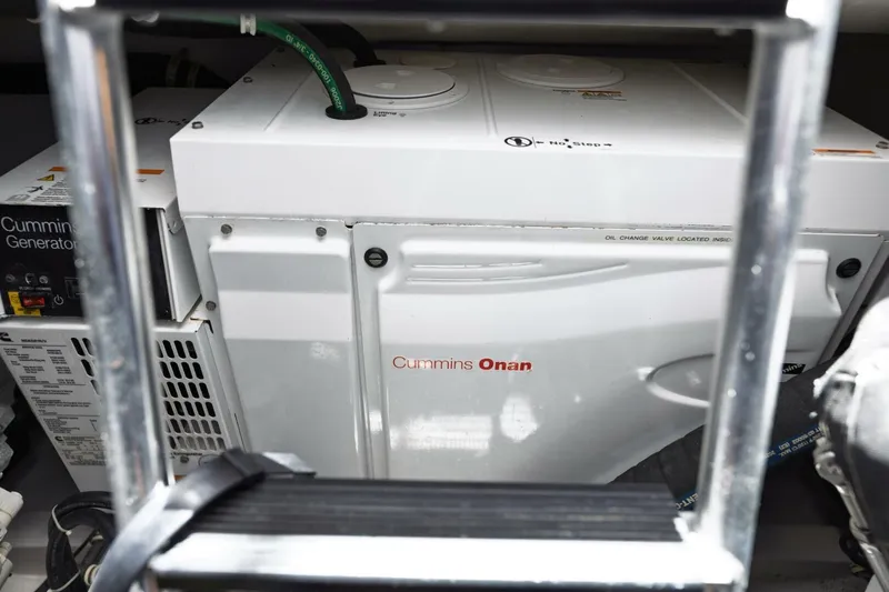 Slide: The Image of Cummins Onan generator in 2018 Hatteras GT45X Flybridge engine room. - 34
