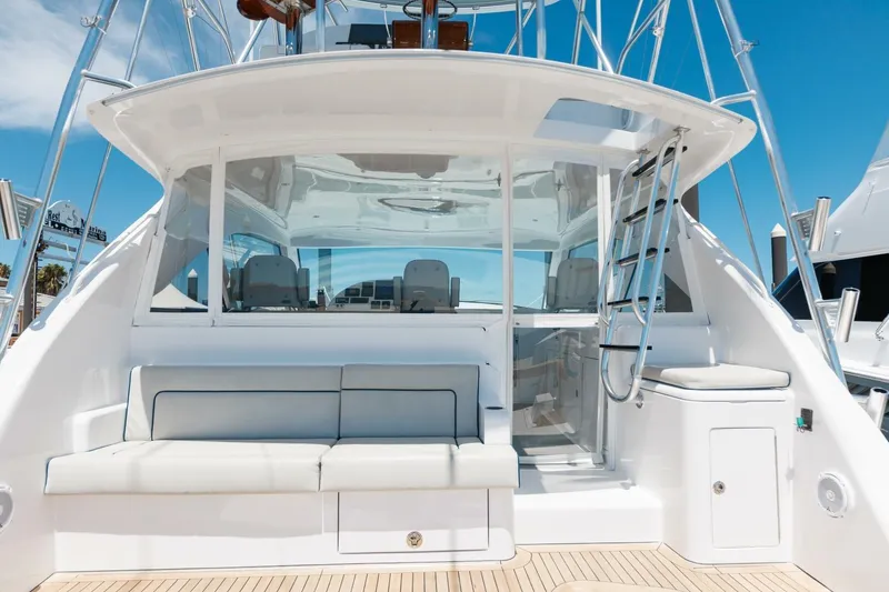 Slide: The Image of 2018 Hatteras GT45X Flybridge yacht with sleek design and spacious seating area. - 36
