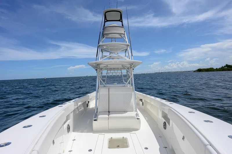 Slide: The Image of 2017 SeaVee 390 boat on open water under clear blue sky. - 9