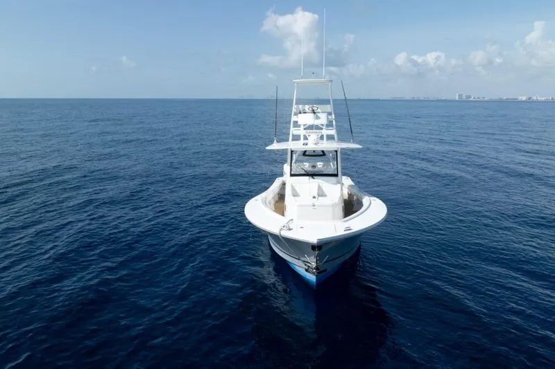 Slide: The Image of 2020 Regulator Motor Yacht on open sea under clear blue sky. - 22