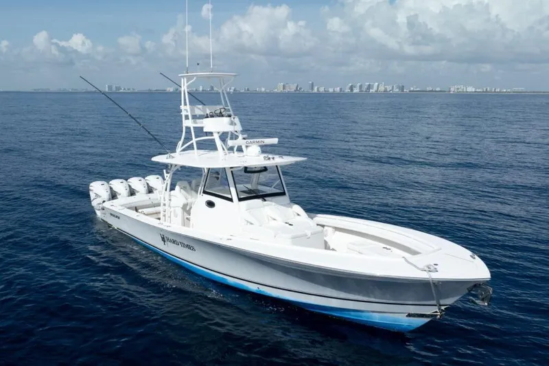 Slide: The Image of 2020 Regulator Motor Yacht on open sea with city skyline in background. - 23