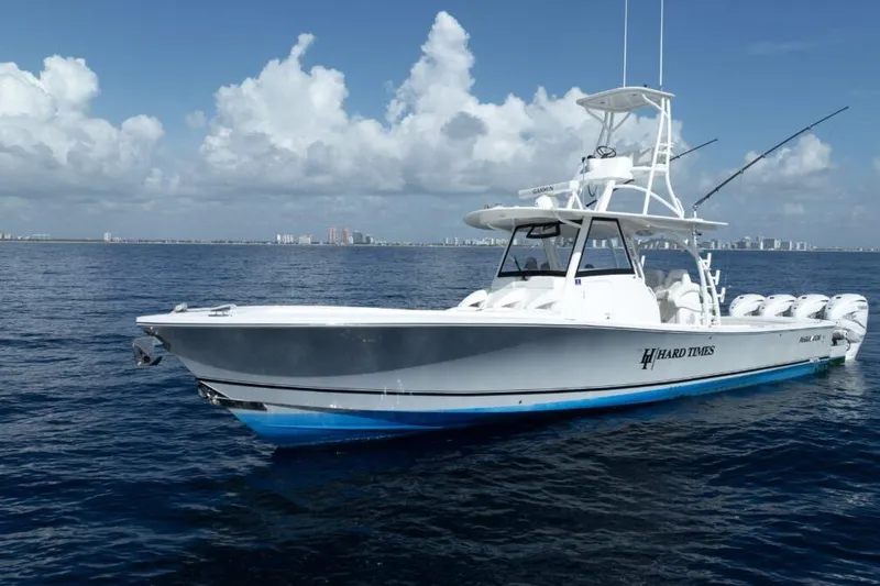 Slide: The Image of 2020 Regulator Motor Yacht on calm ocean with city skyline in background. - 24