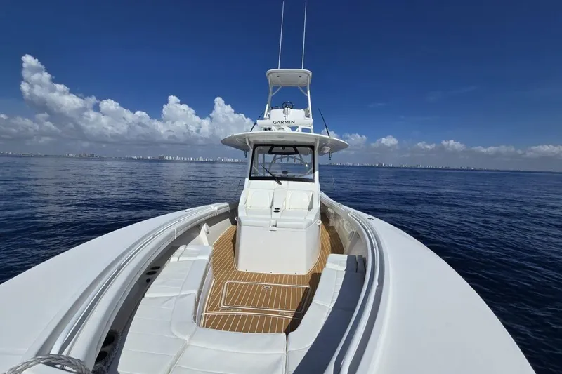 Slide: The Image of 2020 Regulator Motor Yacht on calm ocean with clear blue sky. - 5