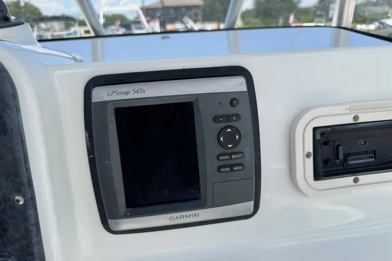 Slide: The Image of Garmin GPSmap 545s on 2008 Sea Hunt 220 Triton boat dashboard. - 12
