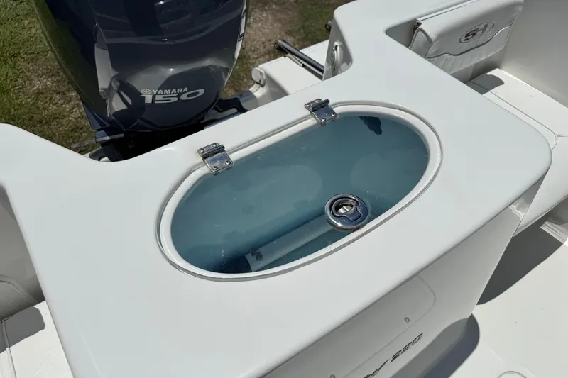 Slide: The Image of 2008 Sea Hunt 220 Triton boat with Yamaha 150 engine and livewell. - 5