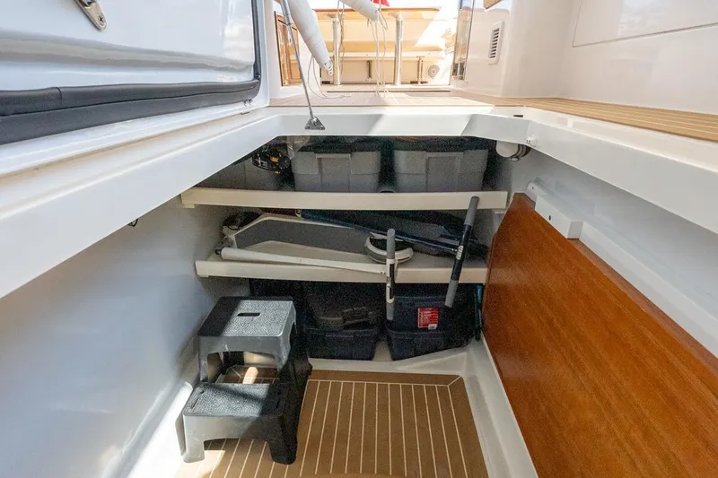 Slide: The Image of Midships Upper Salon Storage Compartment for Large Dining Table - 31