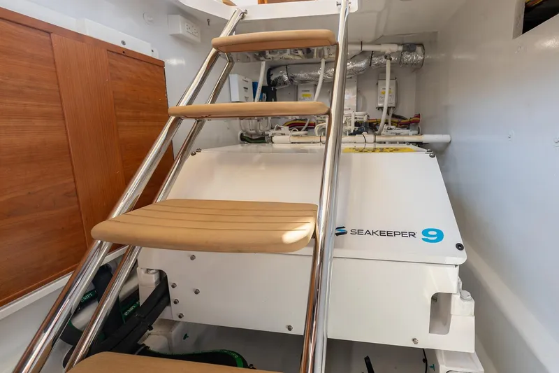 Slide: The Image of Midships Upper Salon Storage Compartment with Seakeeper - 32