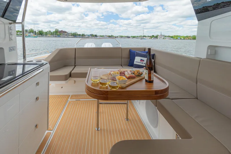 Slide: The Image of Luxurious Nimbus W11 #46 yacht interior with dining setup, 2025 model. - 17