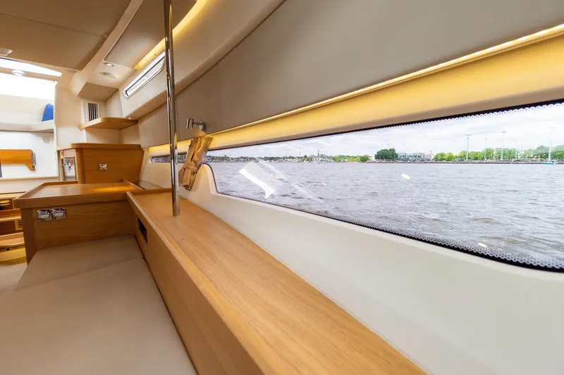 Slide: The Image of Luxurious interior of 2025 Nimbus W11 #46 yacht with scenic water view. - 18