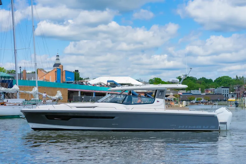 Slide: The Image of Modern Nimbus W11 #46 yacht on a scenic waterfront, 2025 model. - 29