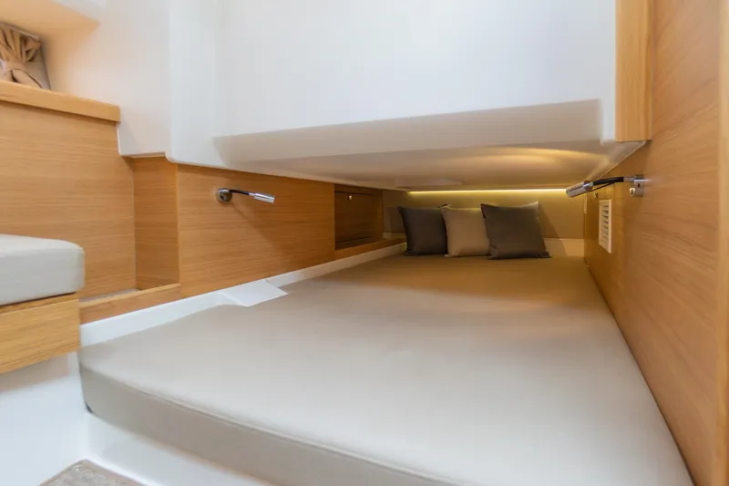 Slide: The Image of Luxurious interior cabin of 2025 Nimbus W11 #46 yacht with cozy bedding. - 42