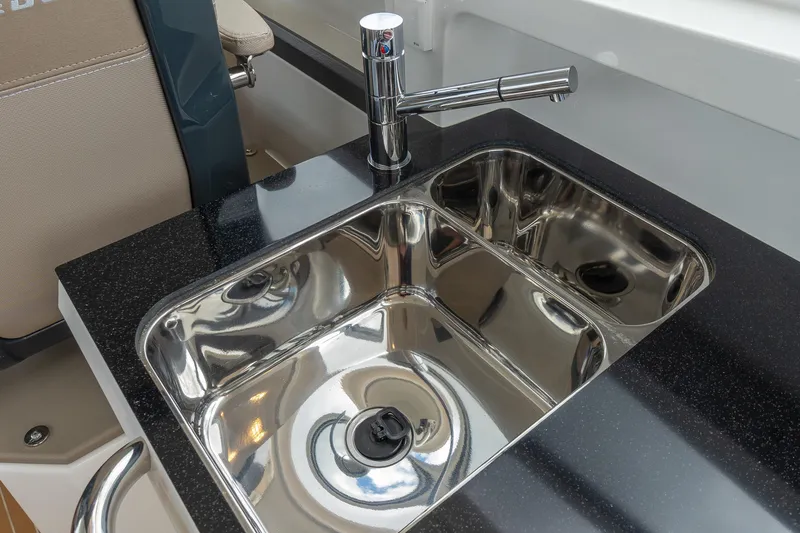 Slide: The Image of Stainless steel sink with modern faucet in Nimbus W11 #46, 2025 model. - 49