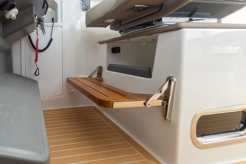 Slide: The Image of Interior of 2025 Nimbus W11 #46 boat with foldable wooden seat and modern design. - 53