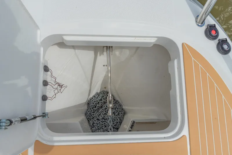 Slide: The Image of Open anchor locker on Nimbus W11 #46 boat, showcasing chain storage, 2025 model. - 70