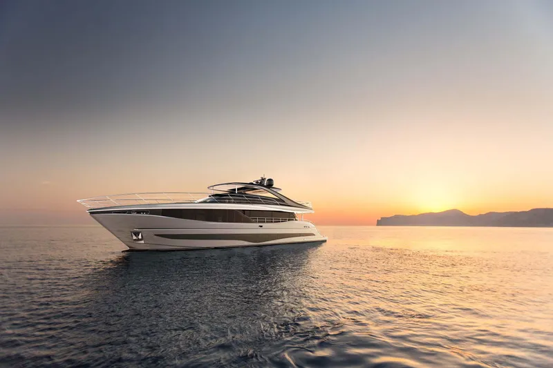 The Image of 2025 Princess Y95 Motor Yacht cruising at sunset on calm waters. - 0