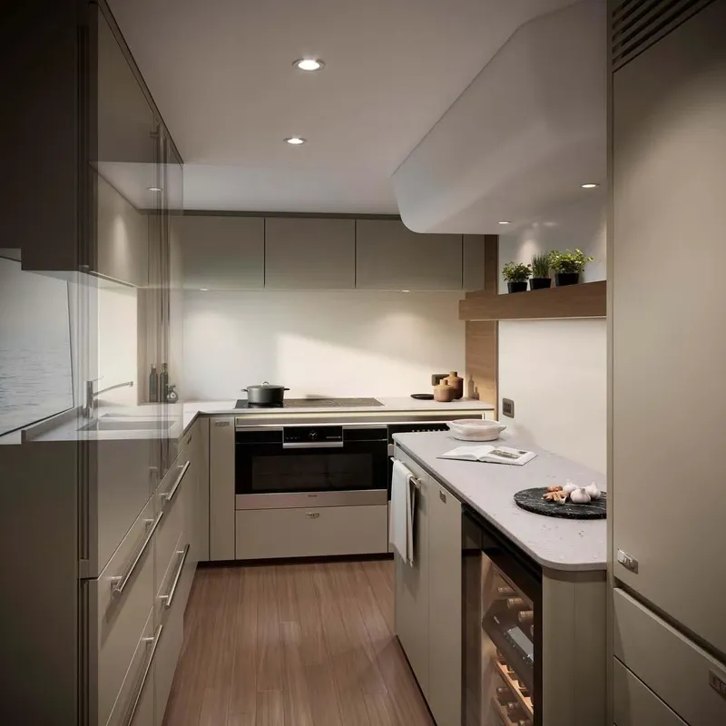 Slide: The Image of Modern kitchen interior on 2025 Princess Y95 Motor Yacht, featuring sleek cabinetry and appliances. - 10