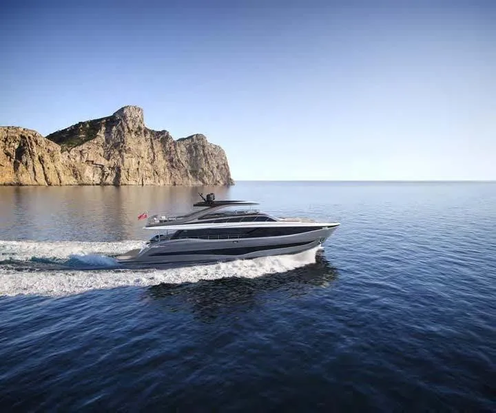 Slide: The Image of 2025 Princess Y95 Motor Yacht cruising near rocky coastline. - 6