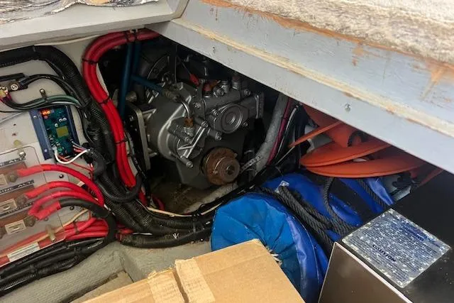 Slide: The Image of Engine compartment of a 1997 Silverton 351 Sedan with visible wiring and components. - 21