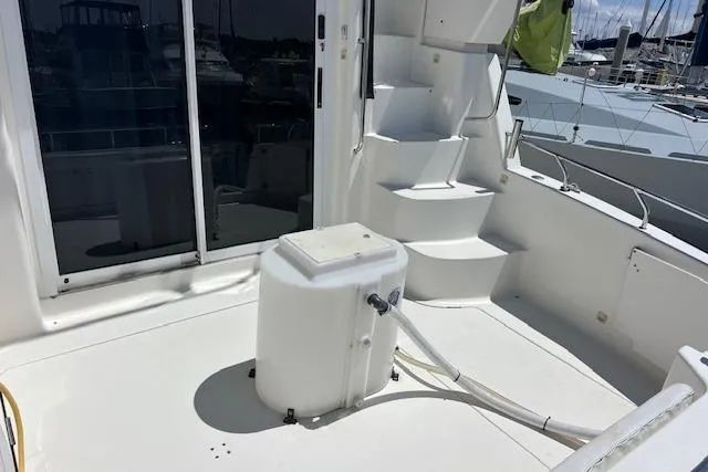 Slide: The Image of 1997 Silverton 351 Sedan Cruiser deck with stairs and equipment. - 6