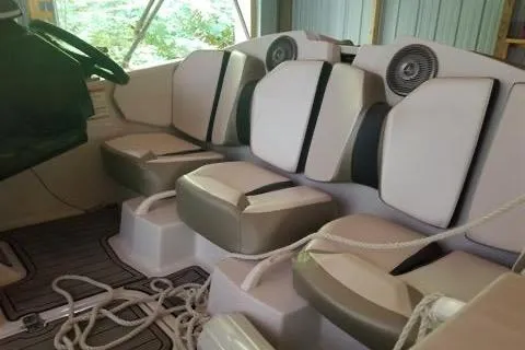 Slide: The Image of Interior of 2015 Scarab 165 boat with seating and ropes. - 10
