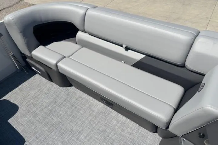 Slide: The Image of 2025 Sun Tracker Party Barge 20 DLX with gray seating and spacious deck. - 10