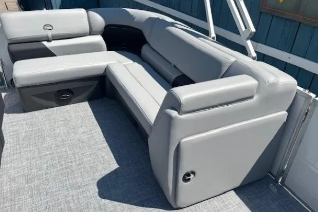 Slide: The Image of 2025 Sun Tracker Party Barge 20 DLX with sleek gray seating and modern design. - 18