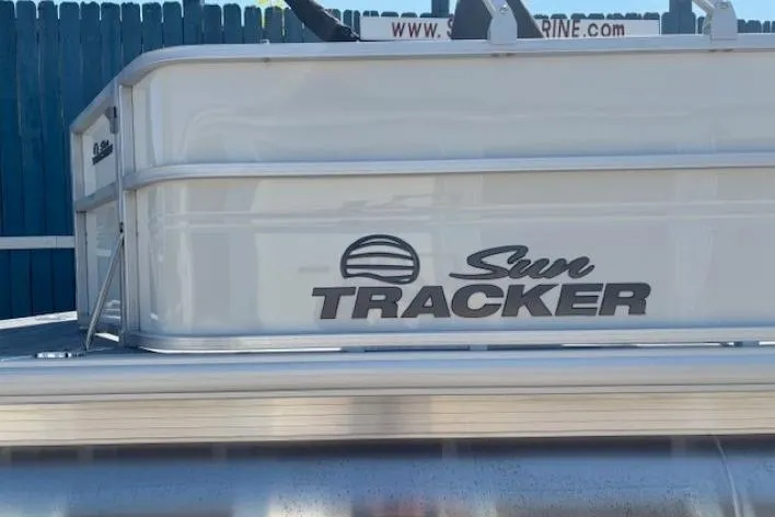 Slide: The Image of 2025 Sun Tracker Party Barge 20 DLX pontoon boat, side view with logo. - 5