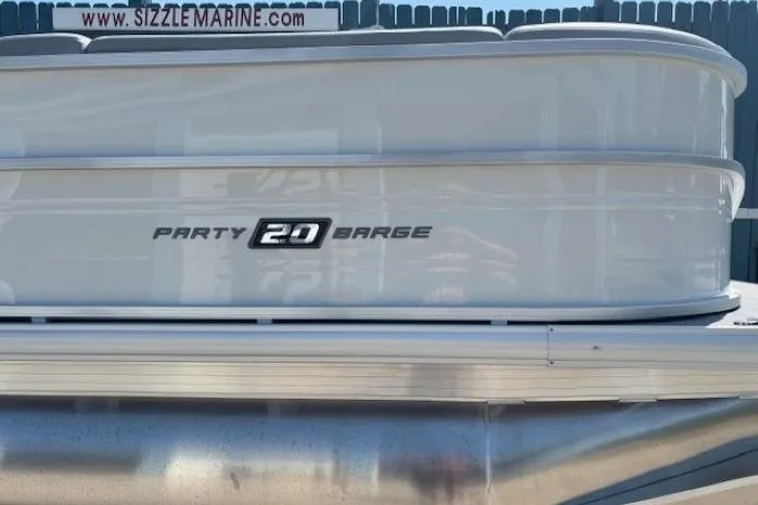 Slide: The Image of 2025 Sun Tracker Party Barge 20 DLX pontoon boat side view. - 6