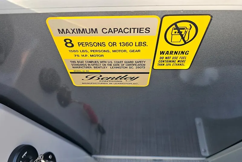 Slide: The Image of 2026 Bentley Pontoons LE 180 Cruise interior with spacious seating and storage compartments. - 15