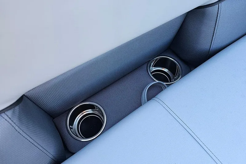 Slide: The Image of 2026 Bentley Pontoons LE 180 Cruise interior with gray seating and storage compartments. - 22