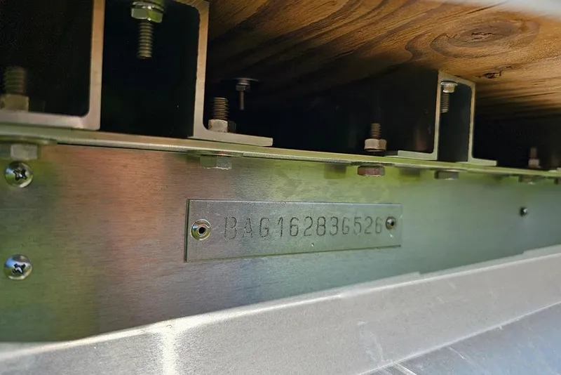 Slide: The Image of 2026 Bentley Pontoons LE 180 Cruise hull identification number plate. - 27