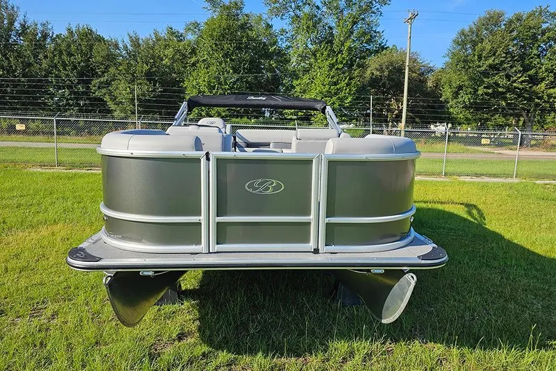 Slide: The Image of 2026 Bentley Pontoons LE 180 Cruise on grass, showcasing sleek design and modern features. - 4