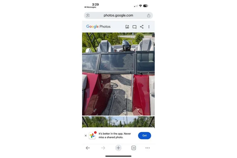 Slide: The Image of 2019 Manitou Legacy 25 RFXW boat interior with red accents and seating. - 26