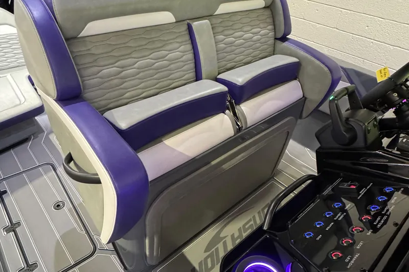 Slide: The Image of 2026 Sunsation 32 CCX boat interior with modern seating and control panel. - 12